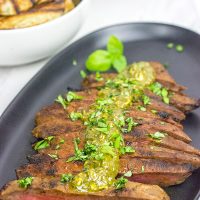 The flat iron steak is the 2nd most tender cut of beef behind only a tenderloin (aka "filet mignon").  Give the flat iron cut a shot with this Marinated Flat Iron Steak with Pesto Butter recipe!