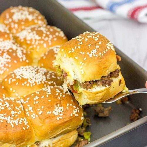 Caught in a summer rainstorm? Move the party inside with a batch of these Pull Apart Cheeseburger Sliders!