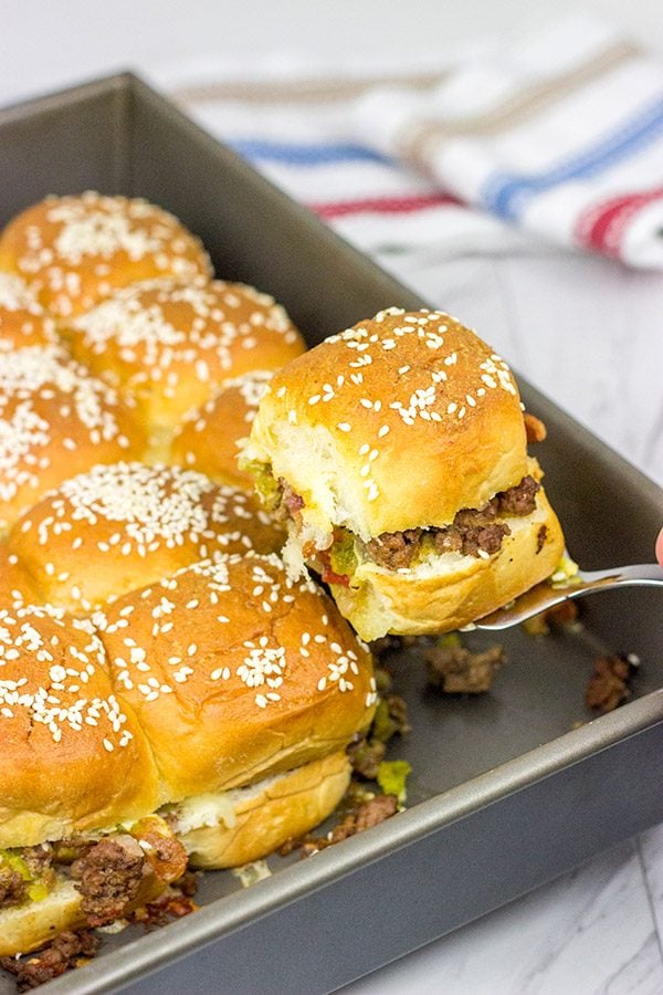 Caught in a summer rainstorm? Move the party inside with a batch of these Pull Apart Cheeseburger Sliders!