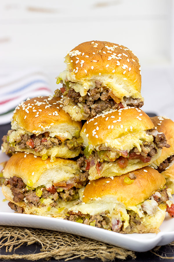 Caught in a summer rainstorm? Move the party inside with a batch of these Pull Apart Cheeseburger Sliders!
