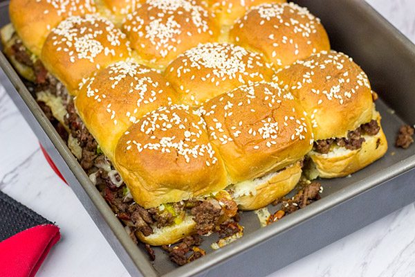 Caught in a summer rainstorm? Move the party inside with a batch of these Pull Apart Cheeseburger Sliders!