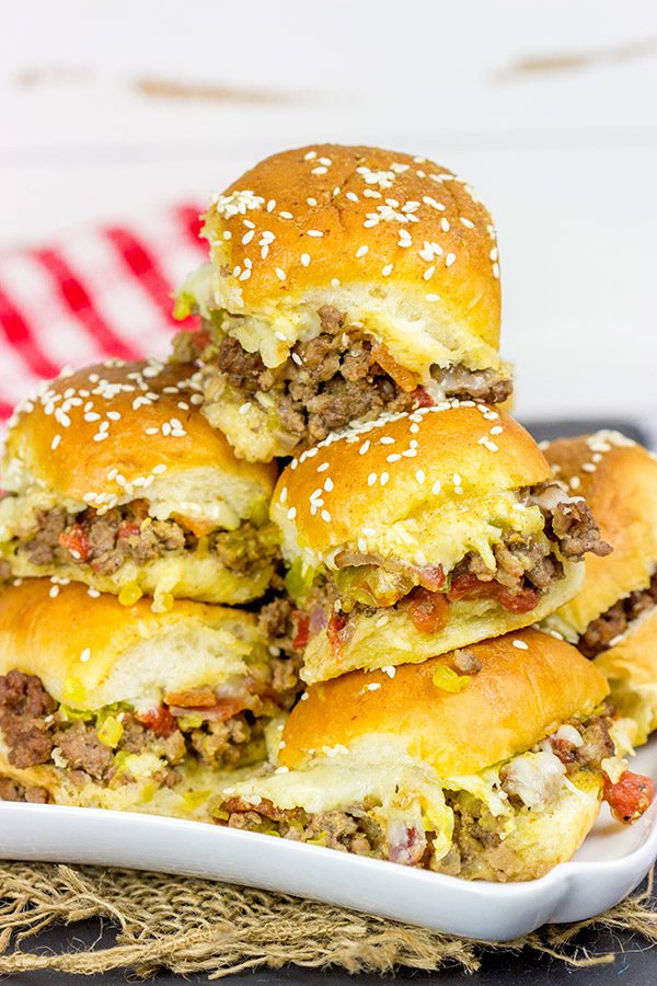 Caught in a summer rainstorm? Move the party inside with a batch of these Pull Apart Cheeseburger Sliders!