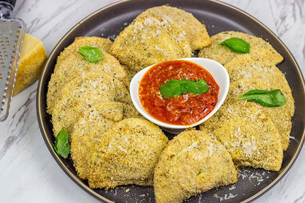These Italian Baked Pierogies are a cinch to make...and they're one heck of a tasty appetizer to serve during football season!
