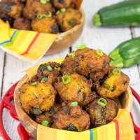 Overwhelmed with zucchini from the garden?  These Zucchini Hushpuppies are a fun and tasty way to use those extra zukes!