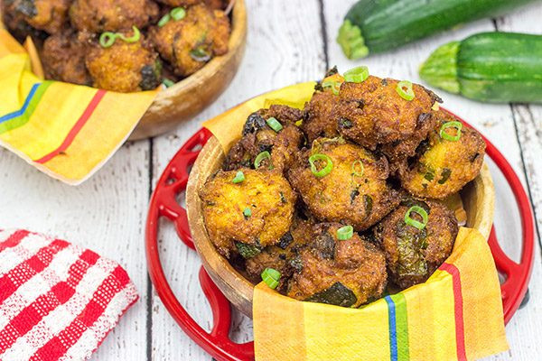 Overwhelmed with zucchini from the garden?  These Zucchini Hushpuppies are a fun and tasty way to use those extra zukes!
