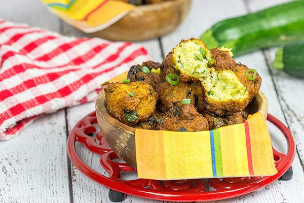 Overwhelmed with zucchini from the garden?  These Zucchini Hushpuppies are a fun and tasty way to use those extra zukes!