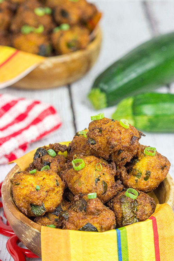 Overwhelmed with zucchini from the garden?  These Zucchini Hushpuppies are a fun and tasty way to use those extra zukes!