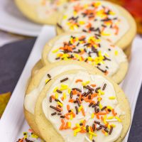 The crisp Fall air (and baking season) is back!  Celebrate the season with a batch of these tasty Frosted Maple Sugar Cookies!