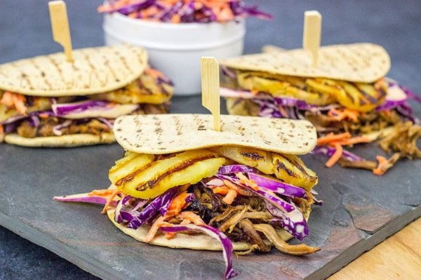 It might be summer, but let's pull out that slow cooker!  These Slow Cooker Hawaiian Pulled Pork Sliders are an easy and delicious way to feed a crowd!