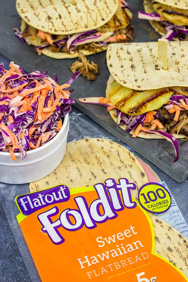 It might be summer, but let's pull out that slow cooker!  These Slow Cooker Hawaiian Pulled Pork Sliders are an easy and delicious way to feed a crowd!