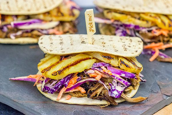 It might be summer, but let's pull out that slow cooker!  These Slow Cooker Hawaiian Pulled Pork Sliders are an easy and delicious way to feed a crowd!