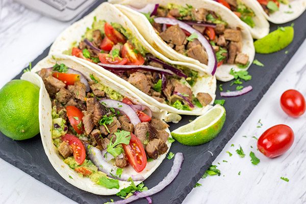 Smoked Brisket Tacos are one of the best things about summer! Learn some brisket-smoking tricks, and grab the recipe for these tasty tacos!