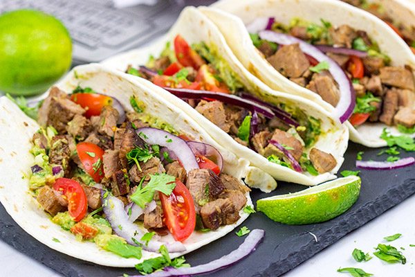 Smoked Brisket Tacos are one of the best things about summer! Learn some brisket-smoking tricks, and grab the recipe for these tasty tacos!