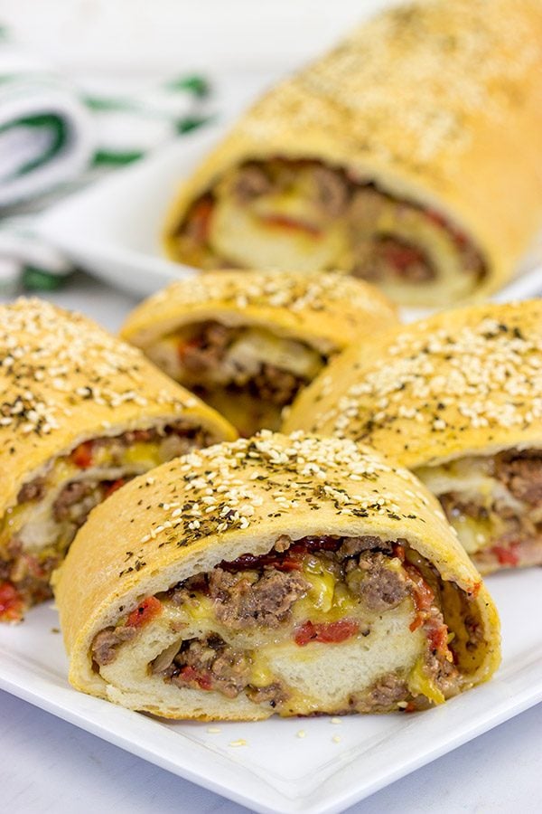 Start with your favorite burger toppings, roll 'em up in pizza dough, and you end up with these tasty (and fun!) Cheeseburger Rollups!