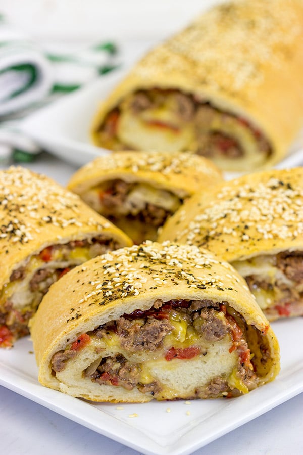 Start with your favorite burger toppings, roll 'em up in pizza dough, and you end up with these tasty (and fun!) Cheeseburger Rollups!