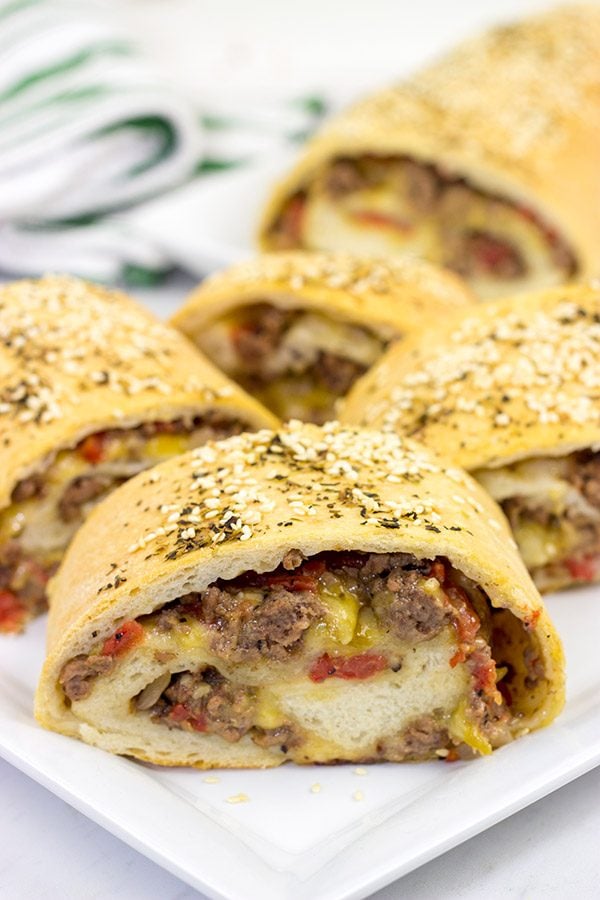 Start with your favorite burger toppings, roll 'em up in pizza dough, and you end up with these tasty (and fun!) Cheeseburger Rollups!