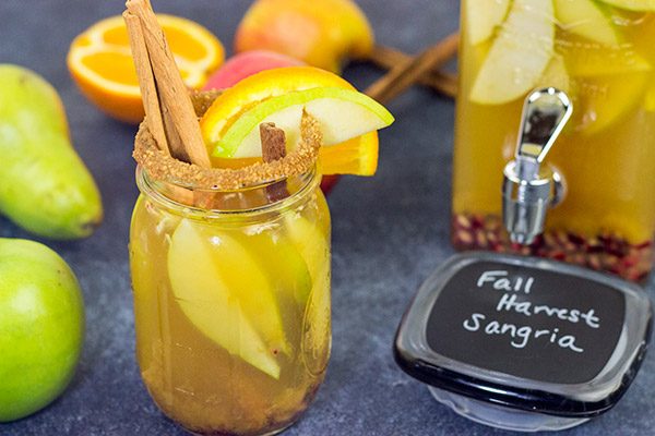 Celebrate the arrival of Autumn with a glass of this Fall Harvest Sangria.  It's full of your favorite fruits, and it can be made with either red or white wine!