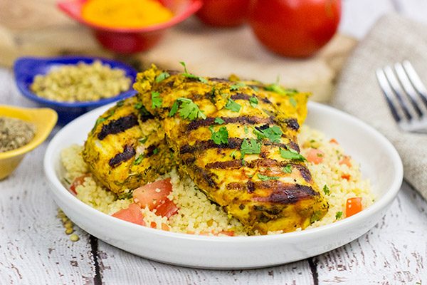 This Grilled Moroccan Chicken starts with an tasty yogurt-based marinade.  Add in the flavor of the grill, and you've got a delicious (and easy) dinner!