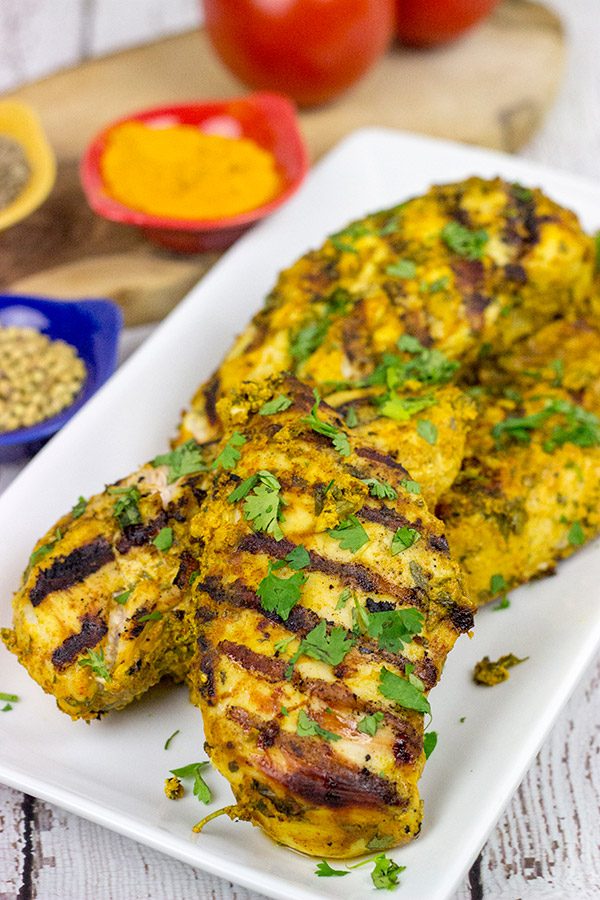This Grilled Moroccan Chicken starts with an tasty yogurt-based marinade.  Add in the flavor of the grill, and you've got a delicious (and easy) dinner!
