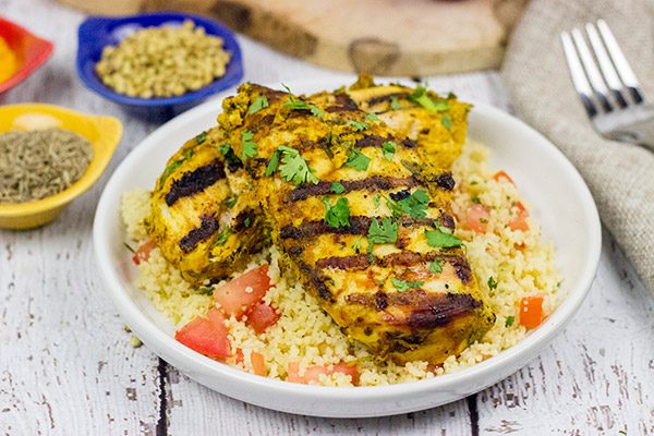 This Grilled Moroccan Chicken starts with an tasty yogurt-based marinade.  Add in the flavor of the grill, and you've got a delicious (and easy) dinner!