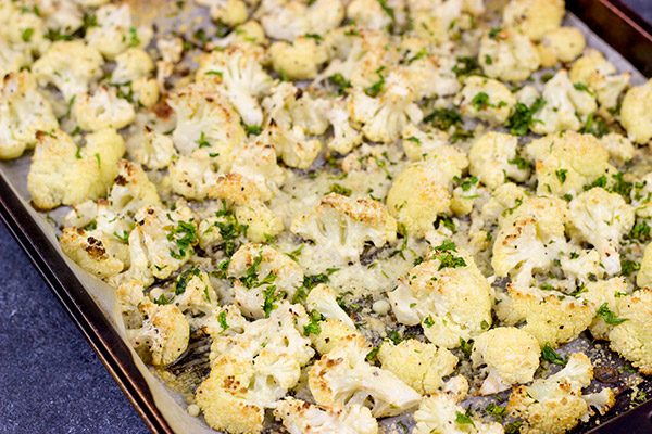 Looking for an easy side dish?  Grab some Parmigiano Reggiano and make a batch of this Parmesan Roasted Cauliflower!