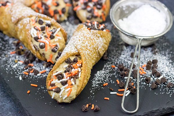 These Pumpkin Spice Cannoli are packed with pumpkin and your favorite Fall spices.  They're a great treat for a cool Autumn evening!