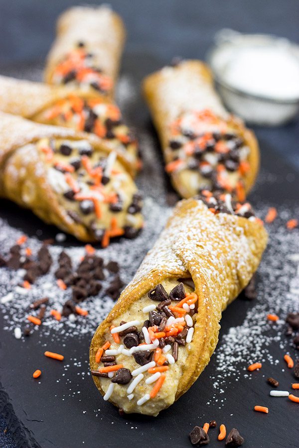These Pumpkin Spice Cannoli are packed with pumpkin and your favorite Fall spices.  They're a great treat for a cool Autumn evening!
