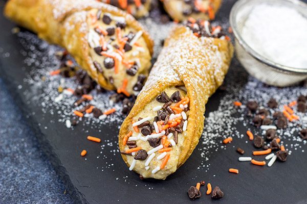 These Pumpkin Spice Cannoli are packed with pumpkin and your favorite Fall spices.  They're a great treat for a cool Autumn evening!