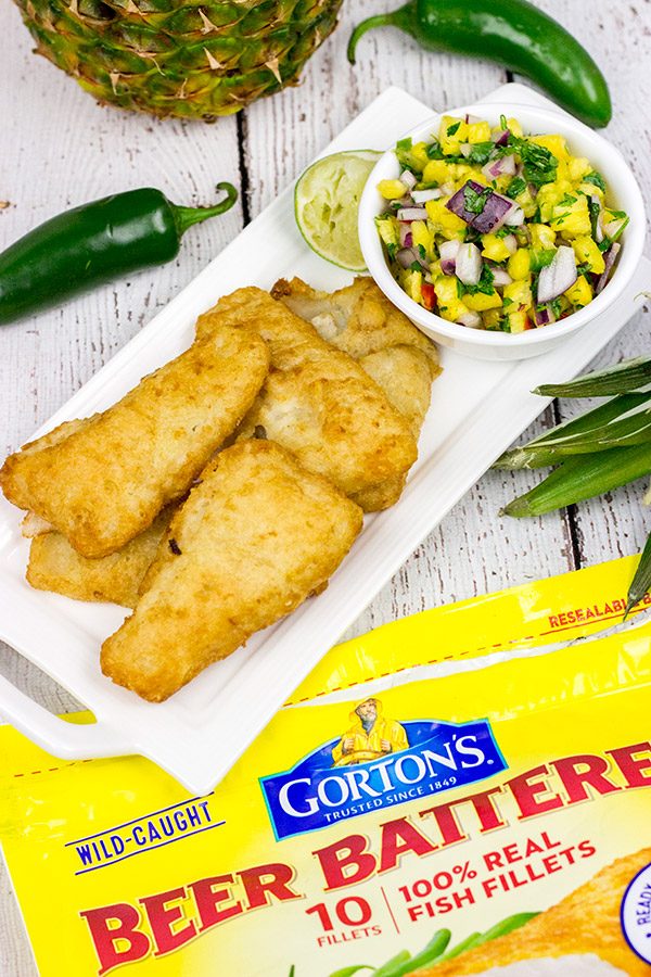 These Spicy Fish Tostadas with Pineapple Salsa are a fun combination of sweet and savory flavors...and they're perfect for either weeknight or weekend meals!