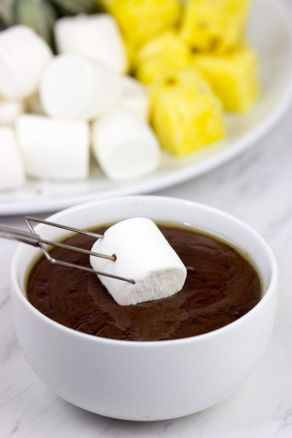 Looking for a fun dessert for a holiday party or just a quiet night with the family?  This Easy Chocolate Fondue is always a hit!