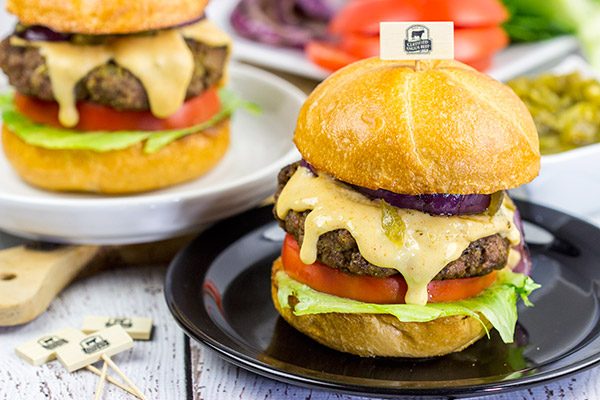 Bring the flavors of New Mexico to the grill with these Hatch Green Chile Burgers!  And don't forget the pepperjack cheese sauce!