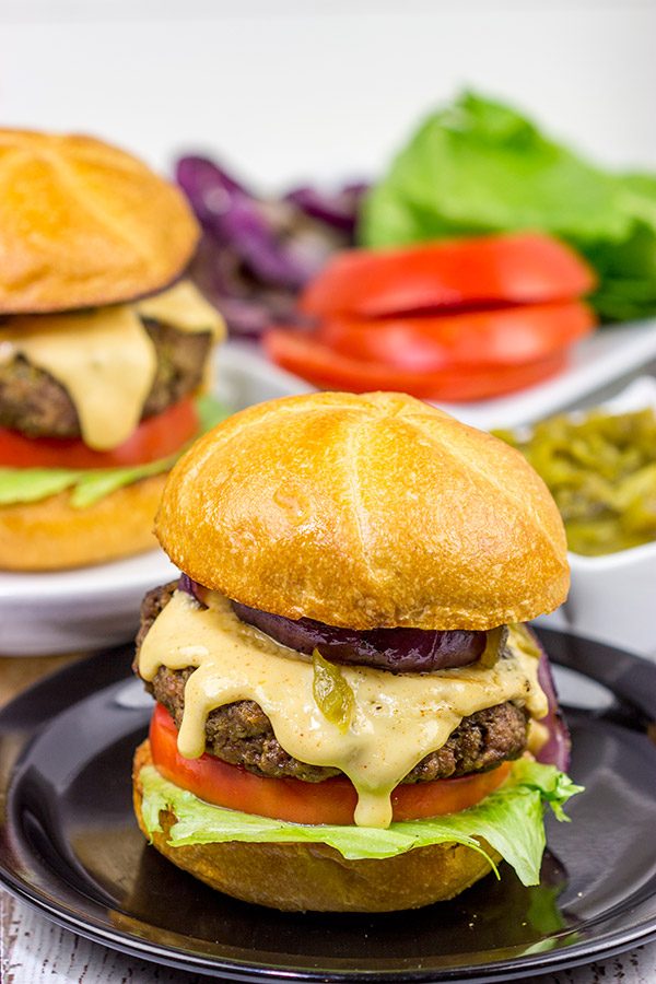 Bring the flavors of New Mexico to the grill with these Hatch Green Chile Burgers!  And don't forget the pepperjack cheese sauce!