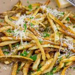 Looking for a unique (and trendy!) side dish?  These Parmesan Truffle Fries are tossed with truffle oil and topped with freshly grated Parmesan cheese.  Enjoy!