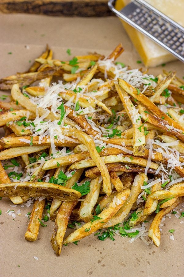 Looking for a unique (and trendy!) side dish? These Parmesan Truffle Fries are tossed with truffle oil and topped with freshly grated Parmesan cheese. Enjoy!
