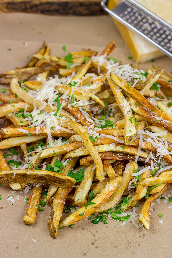 Looking for a unique (and trendy!) side dish? These Parmesan Truffle Fries are tossed with truffle oil and topped with freshly grated Parmesan cheese. Enjoy!