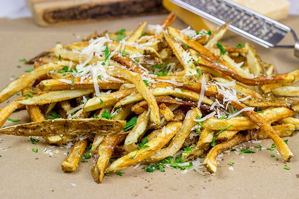 Looking for a unique (and trendy!) side dish? These Parmesan Truffle Fries are tossed with truffle oil and topped with freshly grated Parmesan cheese. Enjoy!