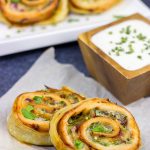 Inspired by the classic barbecue chicken sandwich, these Barbecue Chicken Pinwheels are a fun and tasty snack!  Perfect for busy weekend days with the family or tailgating with friends!