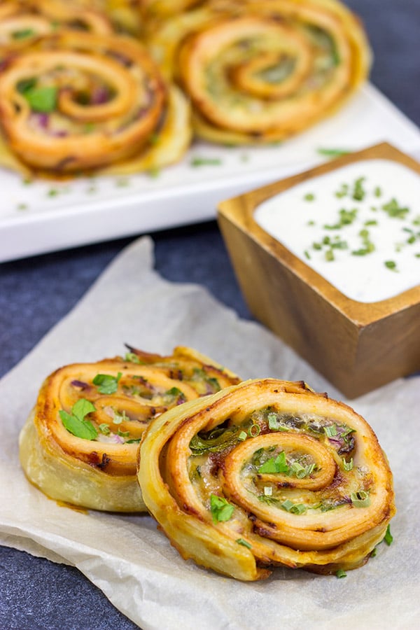 Inspired by the classic barbecue chicken sandwich, these Barbecue Chicken Pinwheels are a fun and tasty snack!  Perfect for busy weekend days with the family or tailgating with friends!