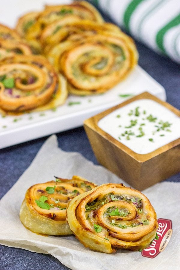 Inspired by the classic barbecue chicken sandwich, these Barbecue Chicken Pinwheels are a fun and tasty snack!  Perfect for busy weekend days with the family or tailgating with friends!