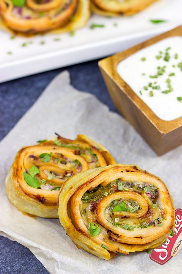 Inspired by the classic barbecue chicken sandwich, these Barbecue Chicken Pinwheels are a fun and tasty snack!  Perfect for busy weekend days with the family or tailgating with friends!