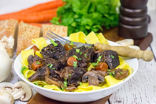Beef Bourguignon is a classic winter dish that simmers in red wine on low temperature for several hours.  It's a delicious meal that's sure to warm you up on these chilly days.