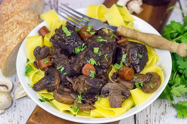 Beef Bourguignon is a classic winter dish that simmers in red wine on low temperature for several hours.  It's a delicious meal that's sure to warm you up on these chilly days.
