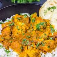 Skip the take-out and make this Chicken Tikka Masala at home! Simmered in a flavorful yogurt marinade, this classic Indian dish is packed with incredible flavor!