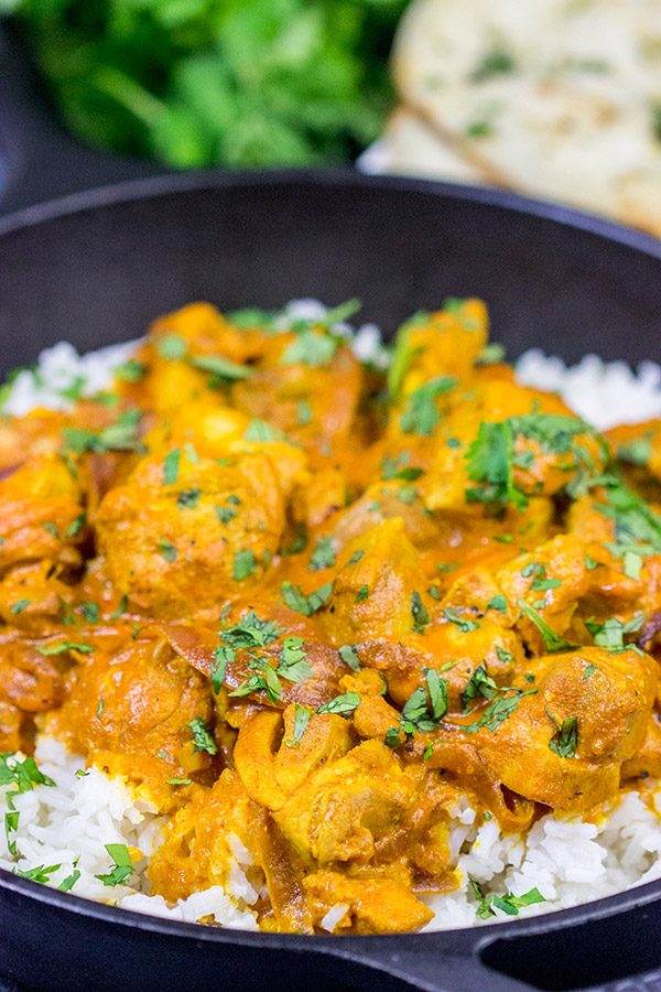 Skip the take-out and make this Chicken Tikka Masala at home!  Simmered in a flavorful yogurt marinade, this classic Indian dish is packed with incredible flavor!