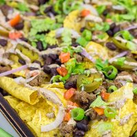 These Ground Beef Nachos are a classic sports food! Grab a plate, turn on the game and enjoy!