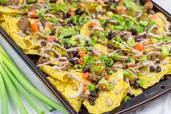 These Ground Beef Nachos are a classic sports food!  Grab a plate, turn on the game and enjoy!