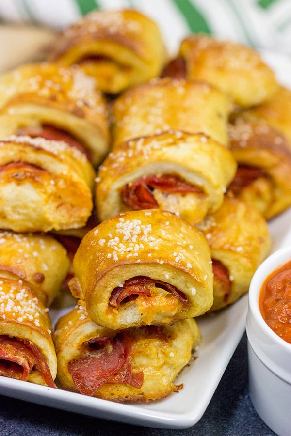 Filled with pepperoni, pizza sauce and 2 kinds of cheese, these Pizza Stuffed Pretzel Bites are the perfect appetizer for watching football!