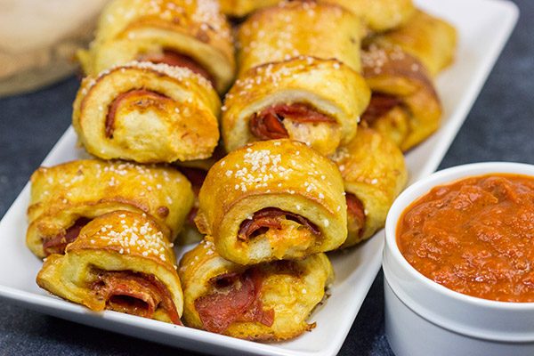 Filled with pepperoni, pizza sauce and 2 kinds of cheese, these Pizza Stuffed Pretzel Bites are the perfect appetizer for watching football!