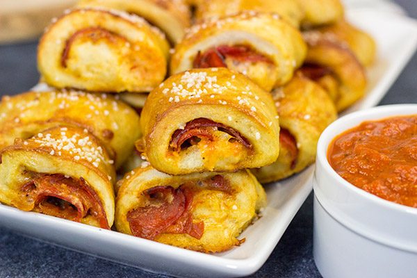 Filled with pepperoni, pizza sauce and 2 kinds of cheese, these Pizza Stuffed Pretzel Bites are the perfect appetizer for watching football!