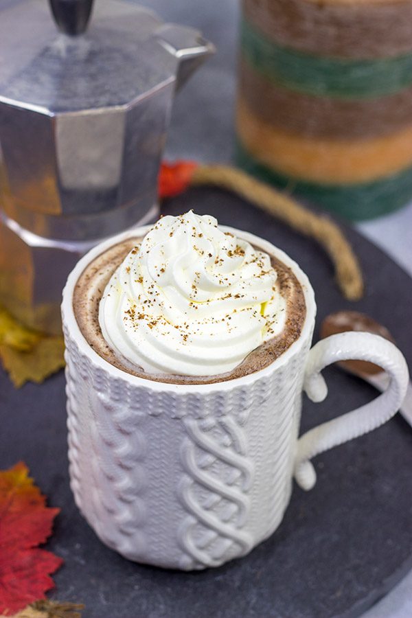 This Pumpkin Spice Mocha Hot Chocolate is a creamy, chocolatey drink that's guaranteed to warm you up on chilly Autumn days!
